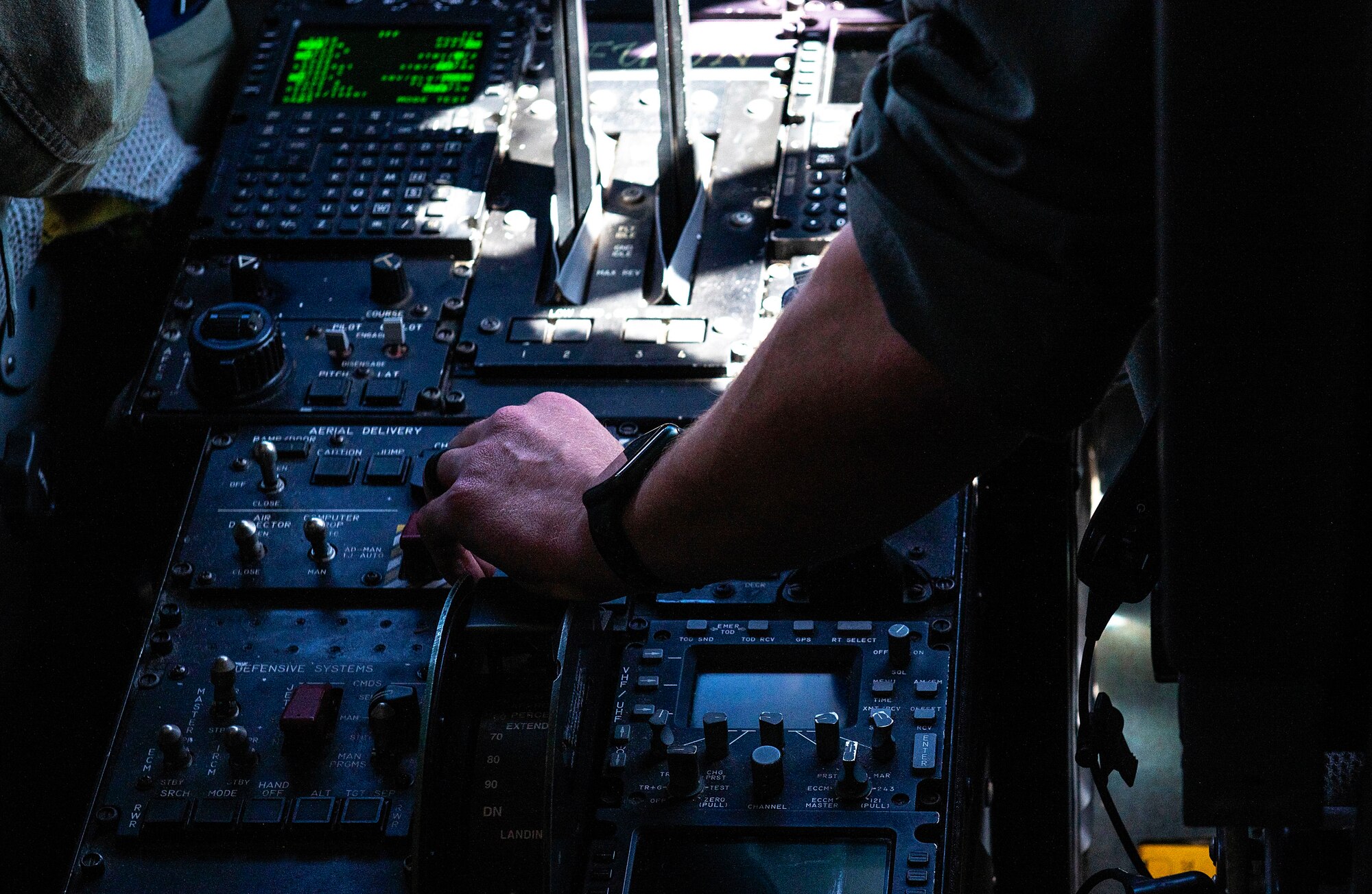 A U.S. Air Force pilot flies a C130J Super Hercules during a formation flight