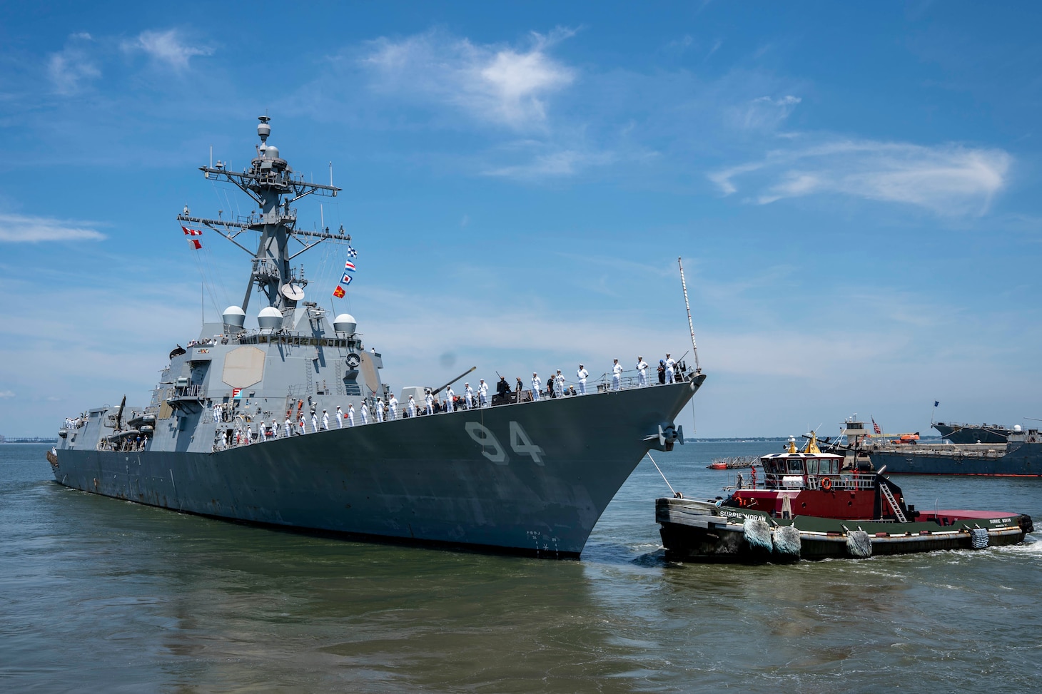 Sailors assigned to the Arleigh Burke-class guided-missile destroyer USS Nitze (DDG 94), man the rails as Nitze deploys from Naval Station Norfolk, July 17.