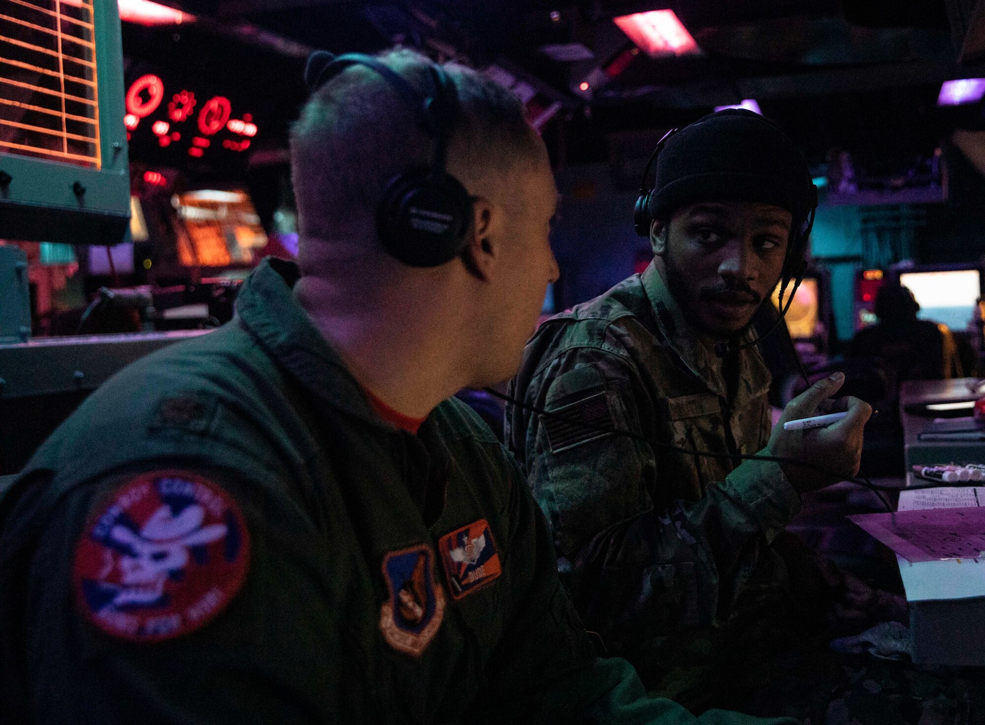 Airmen assigned to 961st Airborne Air Control Squadron onboard Kadena Air Base participate in operations from the Combat Information Center aboard Arleigh Burke-class guided-missile destroyer USS Dewey (DDG 105). Dewey is assigned to Task Force 71/Destroyer Squadron (DESRON) 15, the Navy’s largest forward-deployed DESRON and the U.S. 7th fleet’s principal surface force.