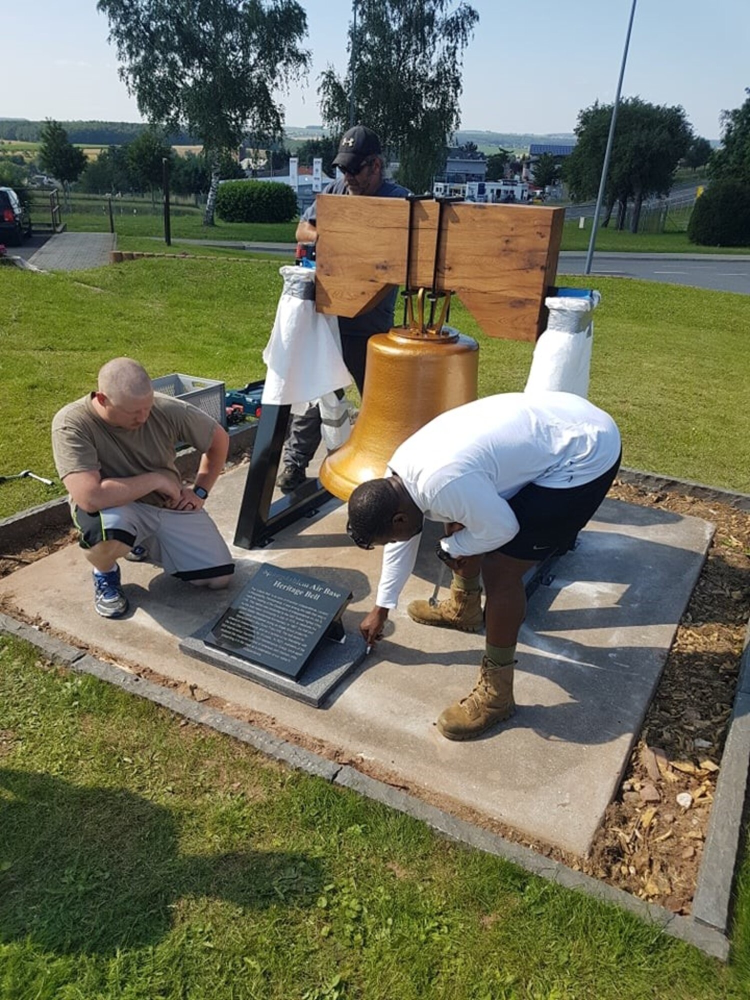 Volunteers, composed of retired and 52nd Maintenance Squadron Airmen, help refurbish the Spangdahlem Heritage Bell in 2021 on Spangdahlem Air Base, Germany. The bell is a replica of the Liberty Bell, honoring America’s independence, and was presented during a ceremony in September 2021.
(Courtesy photo)
