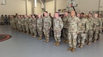 New York Army National Guard Soldiers of the 27th Infantry Brigade Combat Team, who are deploying to Germany as part of the Joint Multinational Training Group-Ukraine, stand at attention during a farewell ceremony at the Thompson Road Armory in Syracuse, New York, July 15, 2022. The New York Soldiers will relieve Florida Army National Guard Soldiers who are currently conducting the training mission.