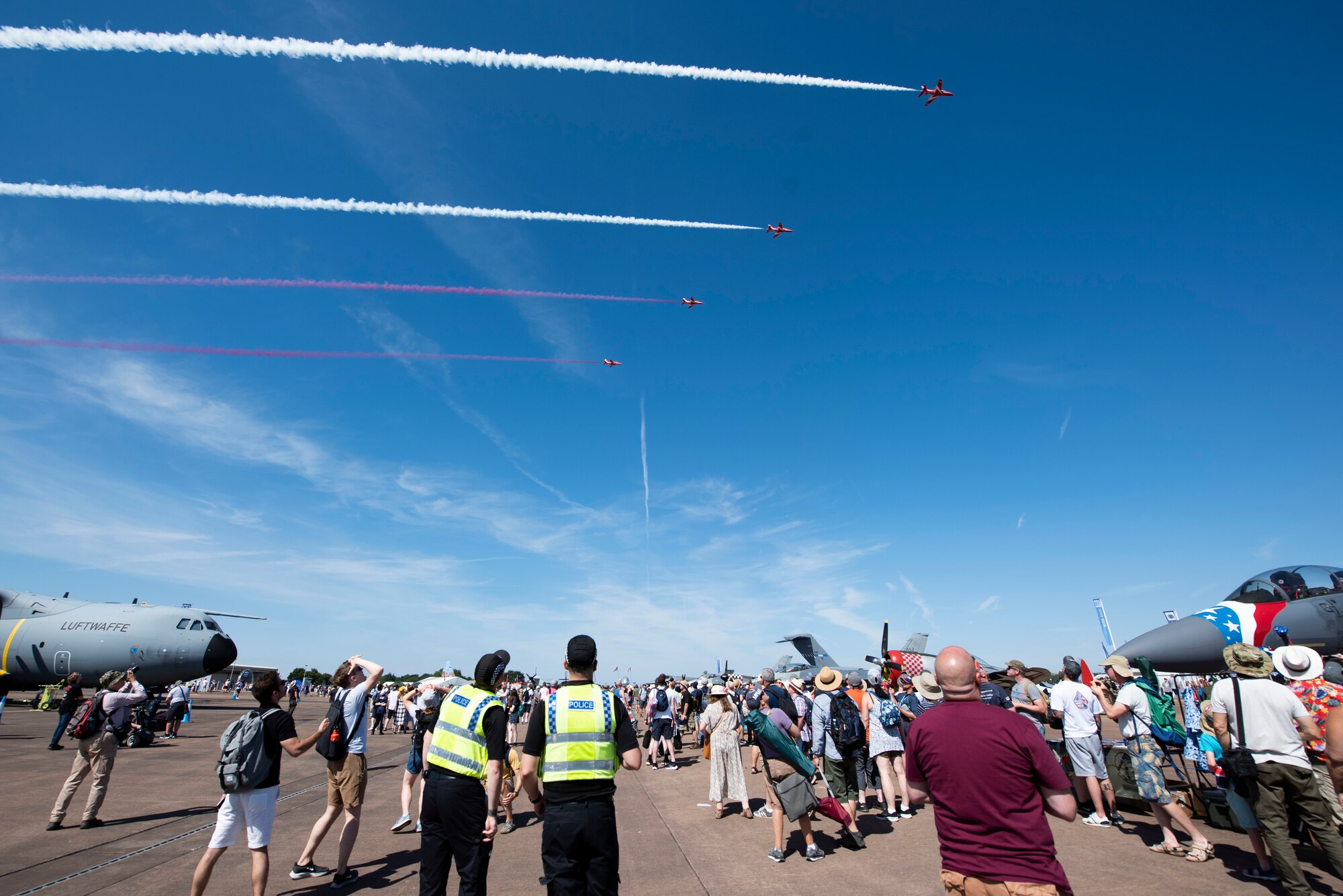 Airshow attendees watch aerial demo