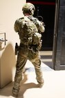 Soldier enters doorway