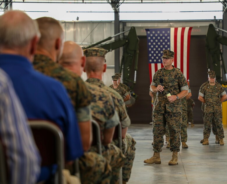 Maj. Gen. Joseph F. Shrader, outgoing commander, U.S. Marine Corps Logistics Command, addresses family members, Marines, civilian-Marines, and guests during a change-of-command ceremony held at Marine Corps Logistics Base Albany, Ga., July 18. (U.S. Marine Corps Photo by Nathan
Hanks)