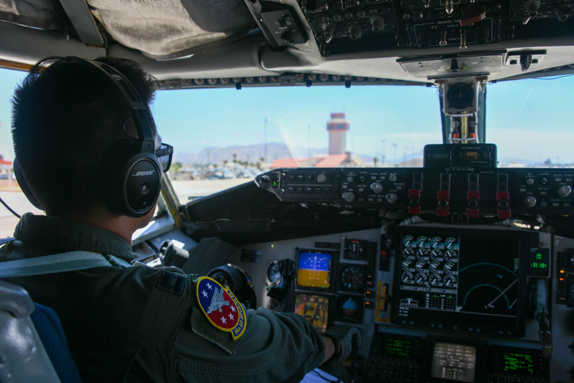 U.S. Air Force Capt. Tae Kim, an instructor pilot from the 54th Air Refueling Squadron at Altus Air Force Base, Oklahoma, performs a preflight check on a KC-135 Stratotanker at March Air Reserve Base, California, July 12, 2022. The mission provided a unique opportunity for 54th ARS instructors to train in unfamiliar airspace while staging out of another location. (U.S. Air Force photo by Airman 1st Class Trenton Jancze)