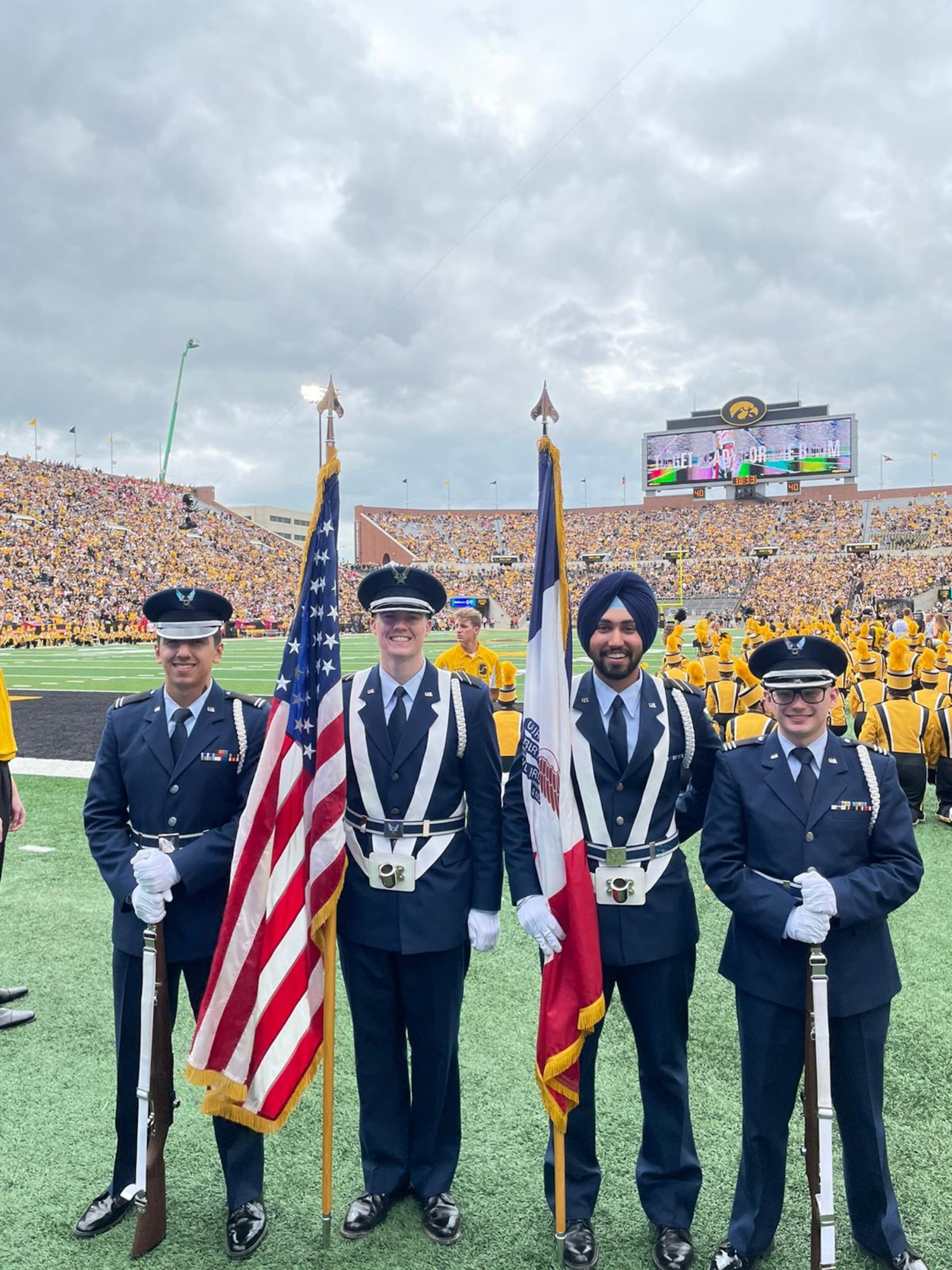 Air Force ROTC Cadet Gursharan Virk takes part in Detachment 255’s color guard at football game at the University of Iowa in 2021. Virk is the first Sikh ROTC cadet to be granted religious accommodations by the Air Force in observation of his faith. The accommodations include wear of a turban and facial hair. (Courtesy photo)