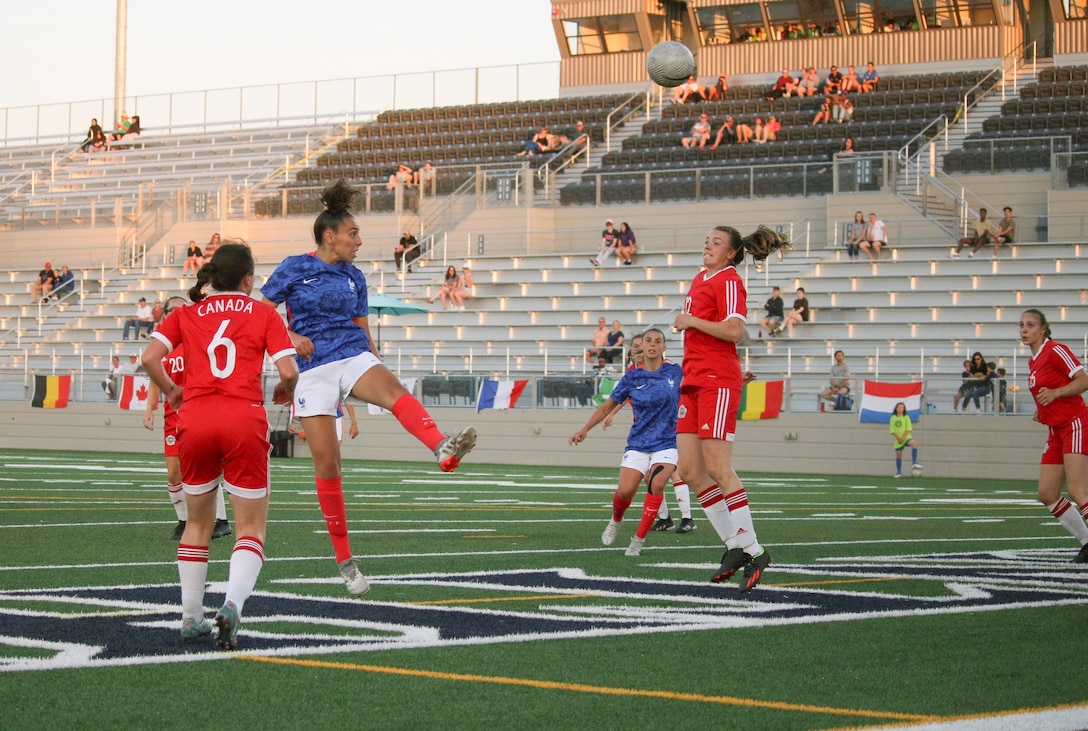 France 's Anissa Belkasni heads in her second goal of the match against Canada in match 16 of the 13th Conseil International du Sport Militaire (CISM) World Women's Military Football Championship hosted by Fairchild Air Force Base in Spokane, Washingon.  This year's championship features teams from the United States, Belgium, Cameroon, Canada, France, Germany, Ireland, Mali, Netherlands, and South Korea.  (Department of Defense Photo by Mr. Steven Dinote, released).