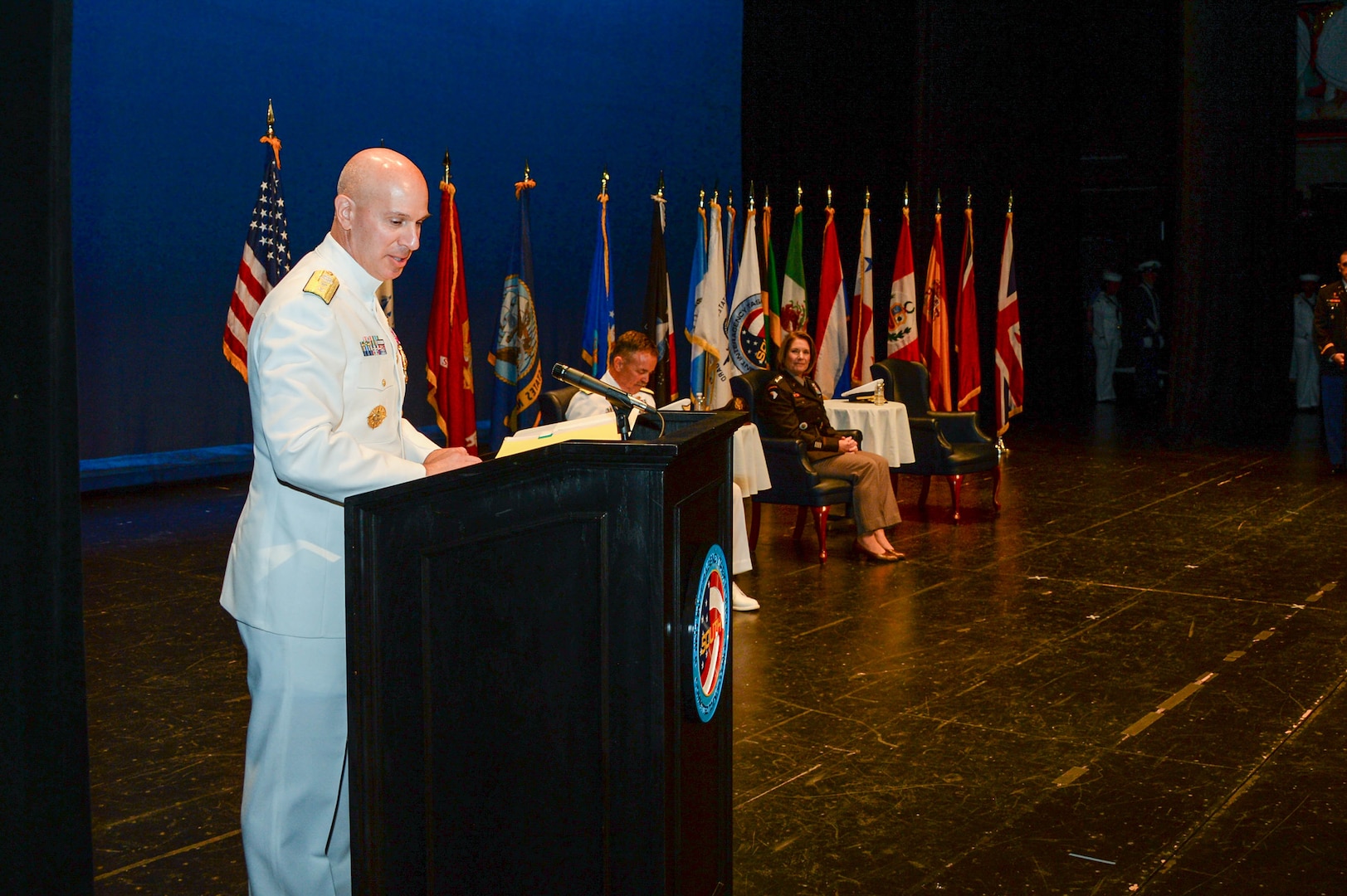 U.S. Coast Guard Rear Adm. Mark Fedor, gives his remarks during a change of command ceremony.
