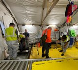 The decontamination team works to clean any potentially contaminated personnel and equipment at the Redstone Arsenal restoration site.