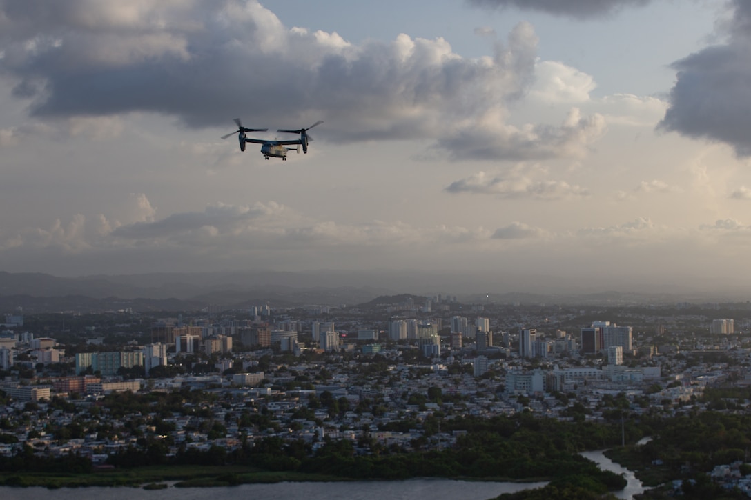 An MV-22B Osprey assigned to Marine Medium Tiltrotor Squadron (VMM) 266 prepares to land during French-Caribbean exercise Caraibes 22 near San Juan, Puerto Rico, June 13, 2022. Caraibes 22 is a French-led, large-scale, joint-training exercise in the Caribbean involving naval, air, and land assets from the French, U.S., and regional forces focused on responding to simulated-natural disasters. VMM-266 is a subordinate unit to 2nd Marine Aircraft Wing, which is the aviation combat element of II Marine Expeditionary Force. (U.S. Marine Corps photo by Cpl. Caleb Stelter)