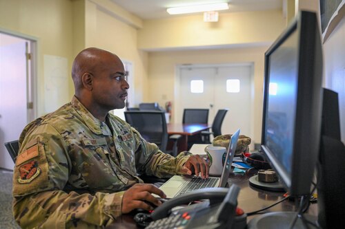 a man uses a computer