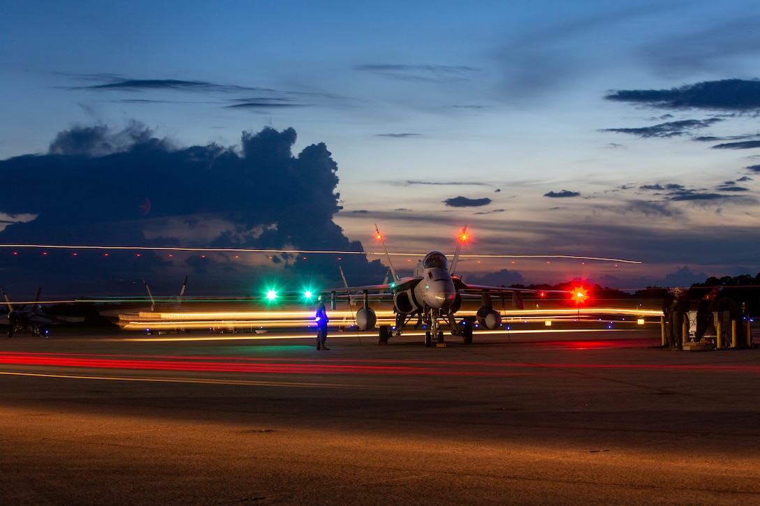 An F/A-18D Hornet assigned to Marine Fighter Attack Squadron (VMFA) 115 taxis to the runway at Marine Corps Air Station Beaufort, South Carolina, June 7, 2022. VMFA-115 supports the Marine Air-Ground Task Force commander by providing supporting arms coordination, conducting multi-sensor imagery reconnaissance, and destroying surface targets and enemy aircraft, day or night, under all weather conditions, during expeditionary, joint, or combined operations. VMFA-115 is a subordinate unit of 2nd Marine Aircraft Wing, the aviation combat element of II Marine Expeditionary Force. (U.S. Marine Corps Sgt. Servante R. Coba)