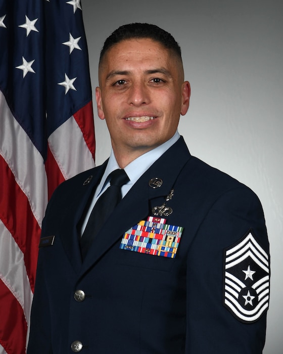Photo is a head shot of Chief Magana.