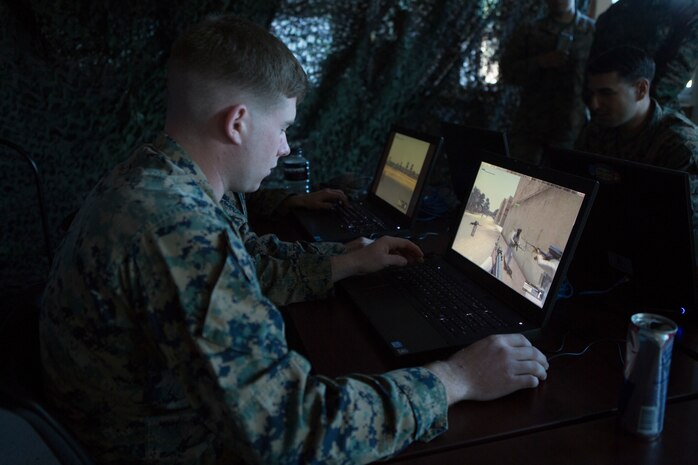 A Marine conducts virtual training on Virtual Battlespace 3 in Camp Lejeune, North Carolina. Live Virtual Constructive Training Environment will enable Marines to train for mission essential tasks through training and readiness events to increase combat readiness while at their home station, at service-level training venues, and while deployed.  (U.S. Marine Corps photo by Lance Cpl. Alexis C. Schneider)