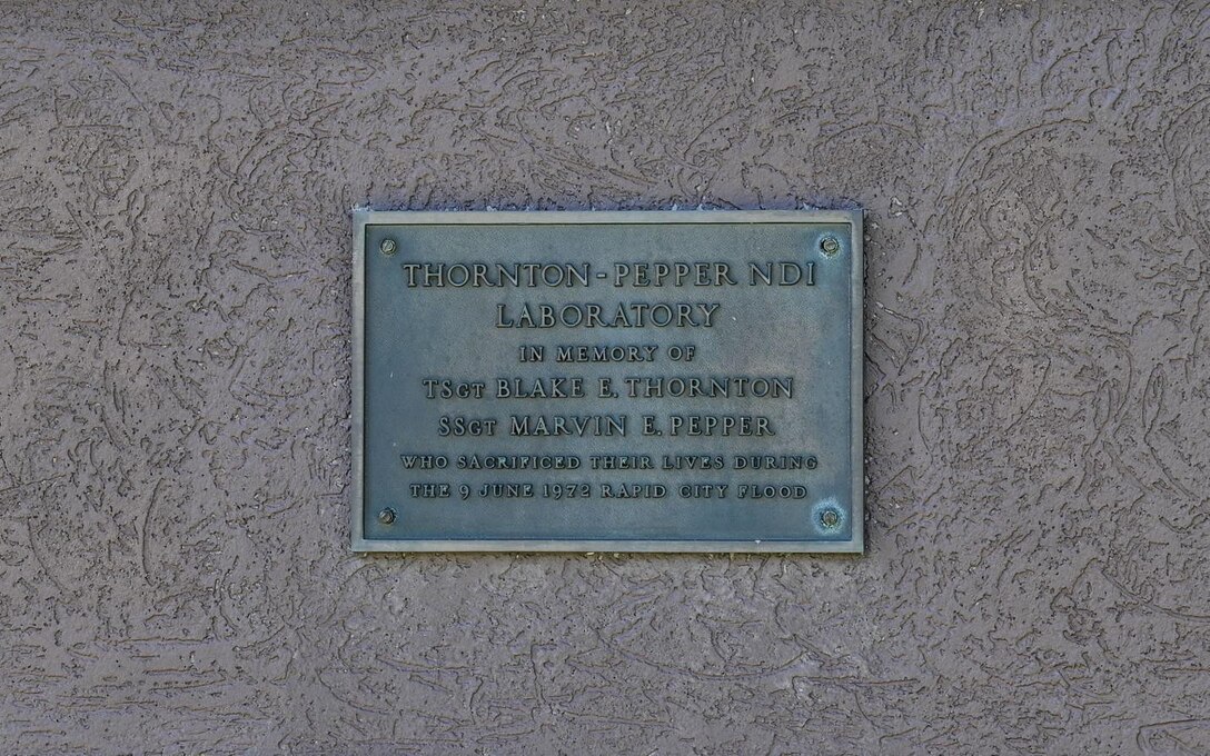 The dedication plaque of the 28th Maintenance Squadron Fabrication Flight Non-Destructive Inspection lab at Ellsworth Air Force Base, S.D., July 13, 2022.