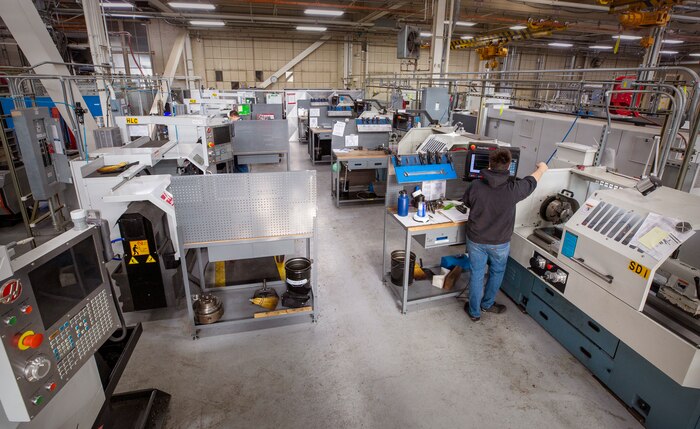 Puget Sound Naval Shipyard & Intermediate Maintenance Facility Shop 31 employees at the short-run work center manufacture components and parts with a short duration turn around time, using lathes. The standardization and modernization of work centers help the Inside Shop Pillar of Naval Sustainment Systems-Shipyards focus on predictability of work completion and the improvement of repair and manufacturing capabilities. (U.S. Navy photo by Wendy Hallmark)