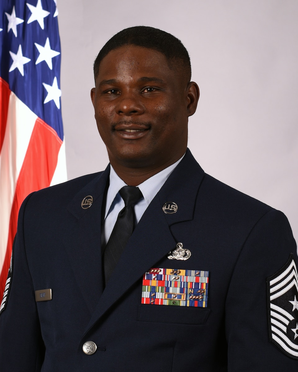 Official photo of the 325th Fighter Wing command chief, Chief Master Sgt. Wayne Sharp.