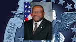 Head and shoulders picture of a black man in a white shirt and dark suit.