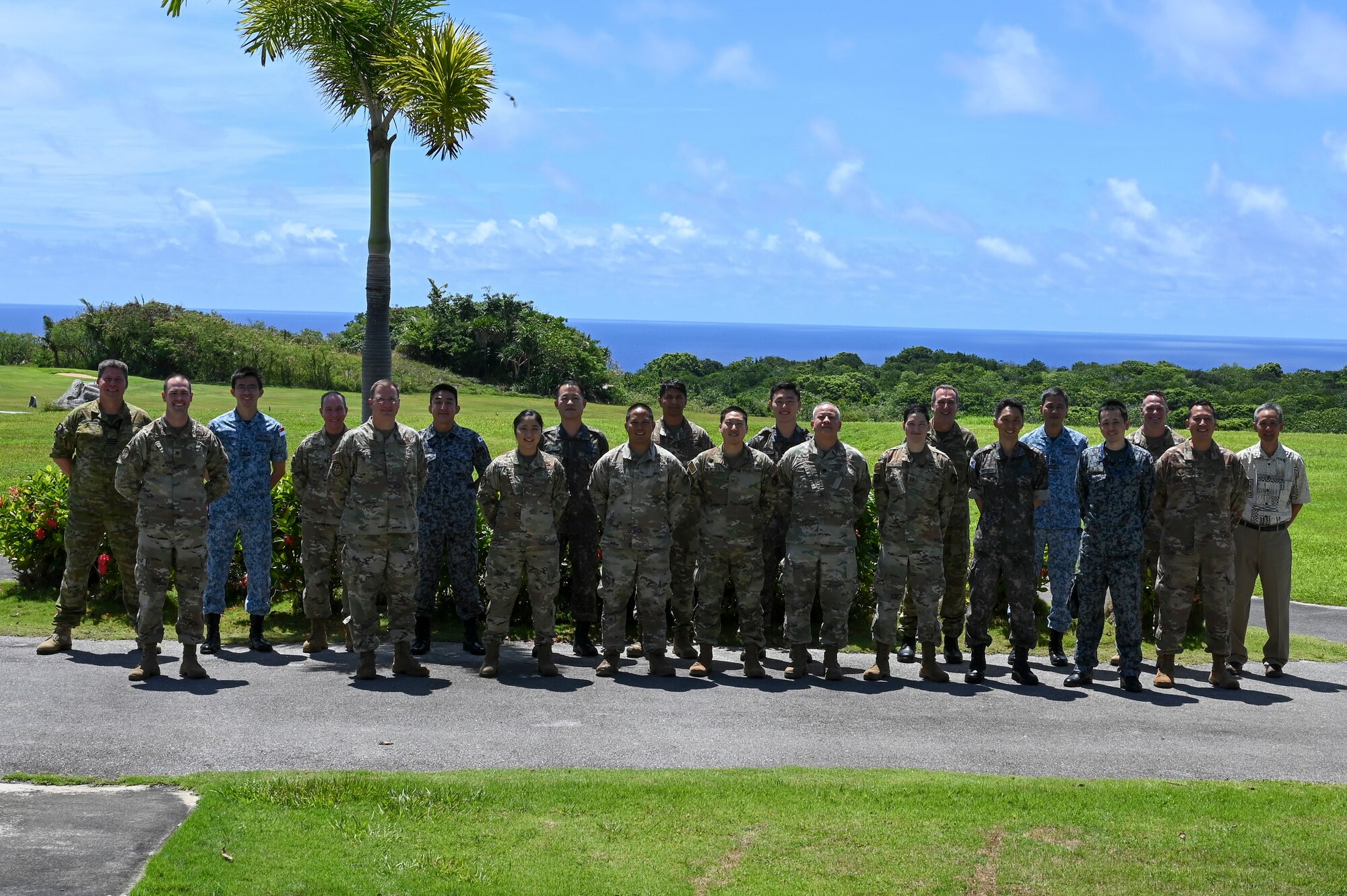 Members of the U.S. Air Force, Royal Australian Air Force, Japan Air Self-Defense Force, Republic of Korea Air Force and the Republic of Singapore Air Force pose for a photo during the Pacific Unity Multi-Lateral Civil Engineer Key Leader Engagement, June 22, 2022 at Andersen Air Force Base, Guam. Senior military leaders from six Indo-Pacific nations gathered for the KLE to focus on multi-lateral efforts accelerating interoperability among their respective engineers. (U.S. Air Force Photo by Airman 1st Class Emily Saxton)