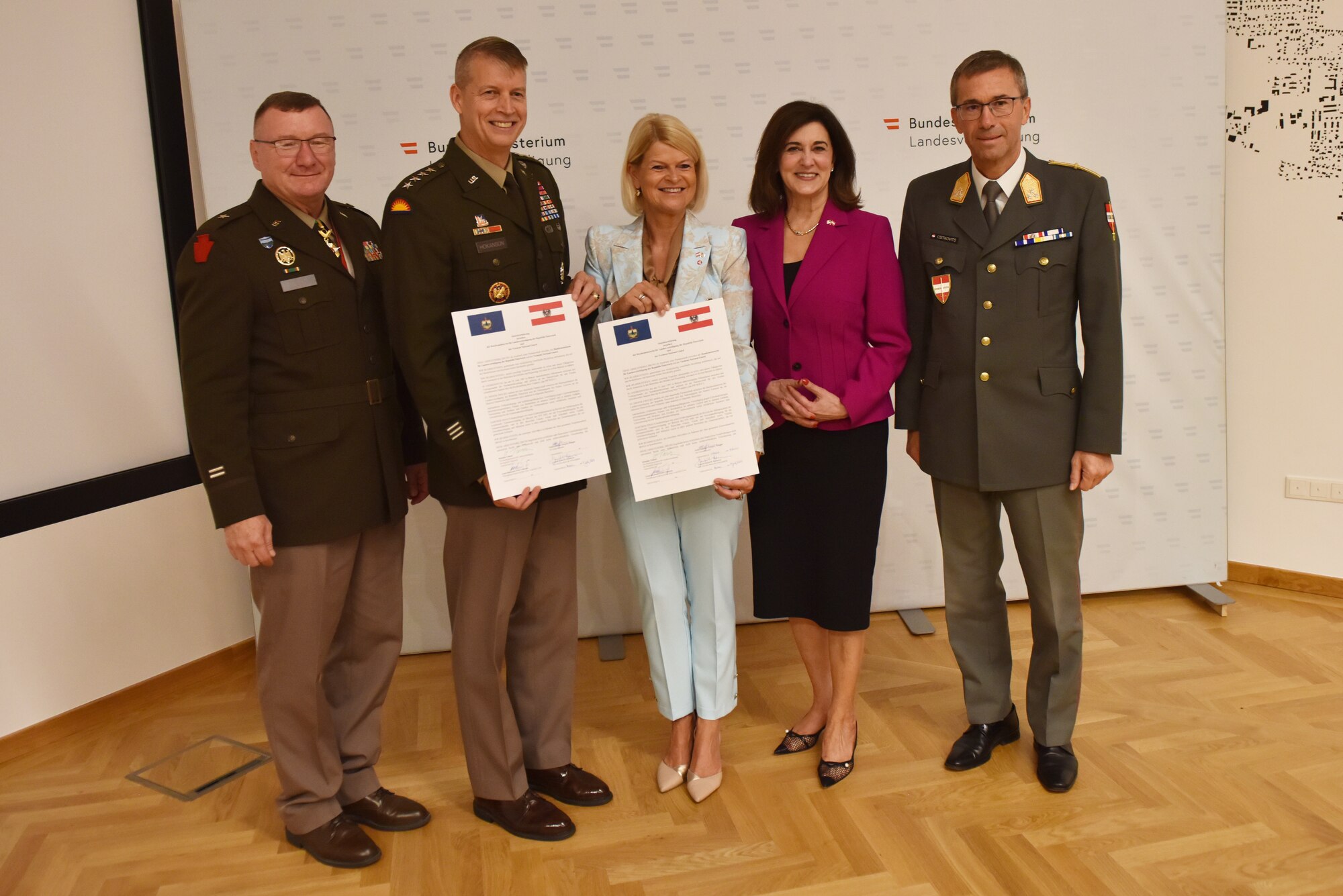 Left to right, U.S. Army Maj. Gen. Gregory Knight, Vermont’s adjutant general; U.S. Army Gen. Daniel Hokanson, chief, National Guard Bureau; Klaudia Tanner, federal minister of defense of the Republic of Austria; U.S. Ambassador to Austria Victoria Kennedy; Lt. Gen. Erich Csitkovits, training director and commandant, National Defence Academy, sign letters of intent between the Vermont National Guard and Republic of Austria July 19, 2022, Vienna, Austria. The Vermont National Guard also has partnerships with North Macedonia, since 1993, and Senegal, since 2008.