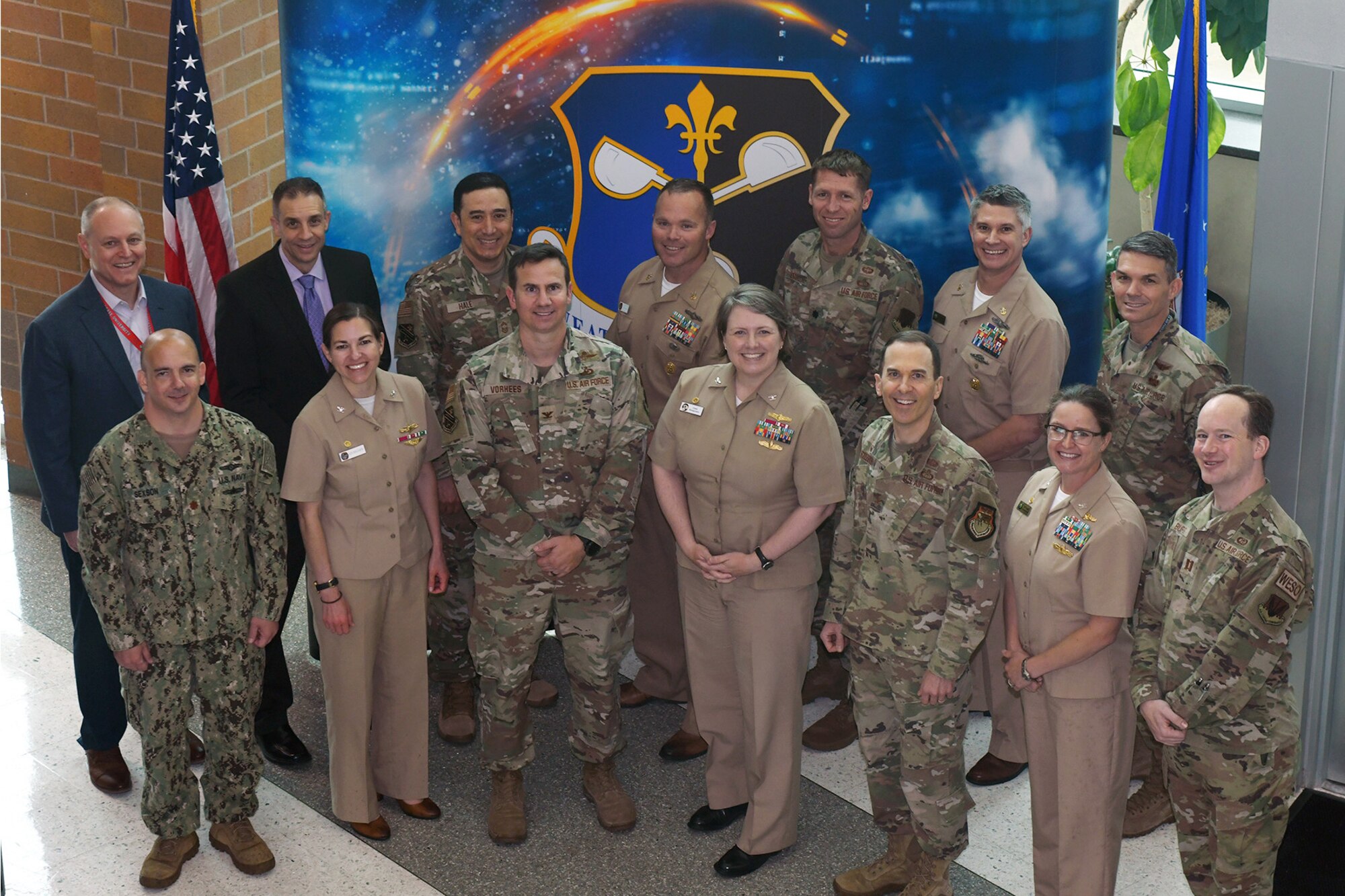 Members of FNMOC (Fleet Numerical Meteorological and Oceanographic Center) and FWC (Fleet Weather Center) are meeting with 557 WW.  The Group Photo will commemorate their visit and be distributed between the AF and Navy.