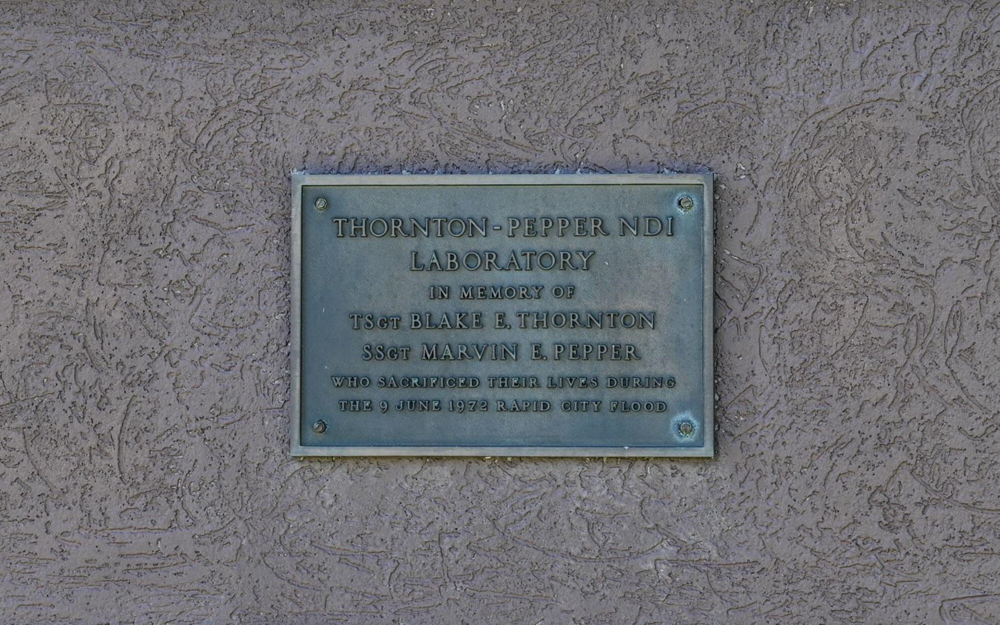 The dedication plaque of the 28th Maintenance Squadron Fabrication Flight Non-Destructive Inspection lab at Ellsworth Air Force Base, S.D., July 13, 2022.