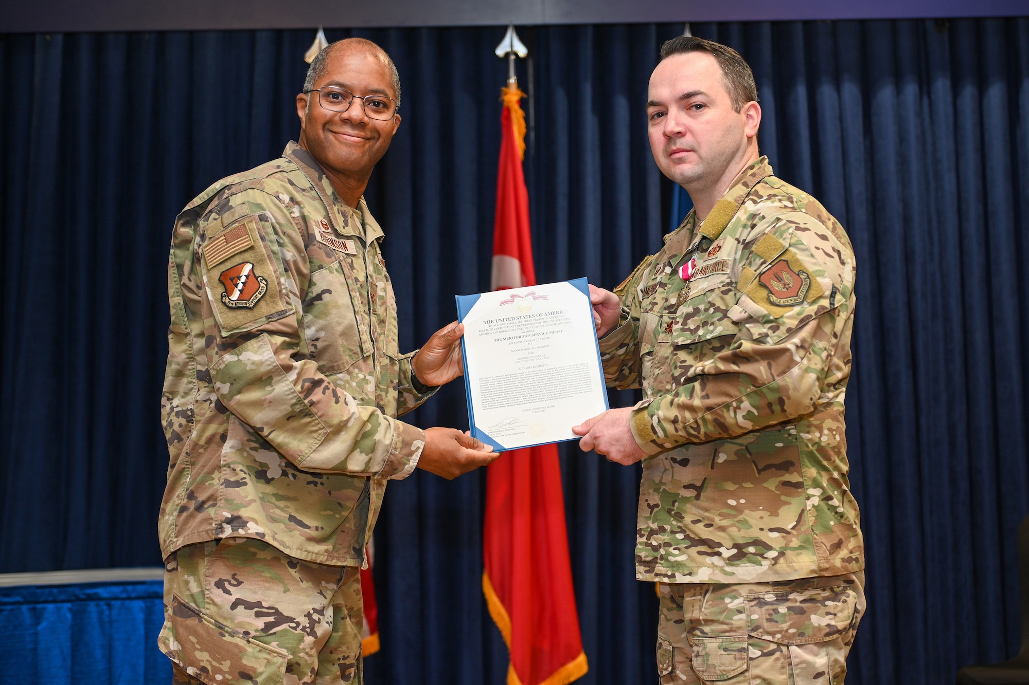 Col. Christopher Robinson (left), 39th Mission Support Group commander, and Maj. Daniel Jamerson, outgoing 39th Force Support Squadron commander, pose for a photo during a change of command ceremony at Incirlik Air Base, Turkey, July 15, 2022.