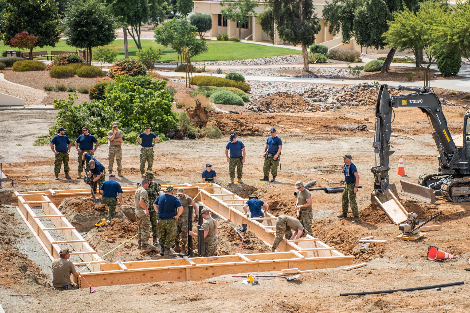 U.S. Airmen assigned to the 107th Civil Engineer Squadron, 107th Attack Wing, New York Air National Guard, Niagara Falls Air Reserve Station, N.Y., participate in a building project alongside the Royal Canadian Air Force, on March Air Reserve Base, Moreno Valley California, July 14, 2022. Members of the CES are performing renovations, alongside the Royal Canadian Air Force, to support March ARB as a part of their yearly Deployment for Training. (U.S. Air National Guard Photo by Senior Airman Daniel Meade)