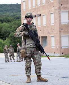 U.S. Army National Guard Spc. James Murphy, assigned to 160th Engineer Company, 721st Troop Command, 72nd Troop Command, prepares for improvised explosive device training on July 14, 2022 at Fort Indiantown Gap, Pa. The unit ran through practical exercises after studying in a classroom environment during annual training.