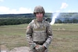 U.S. Army National Guard Spc. Robert Hanshaw of the 1069th Military Police Company, stands in front of a weapons qualification range at Fort Indiantown Gap, Pa. July 13. (U.S. Army National Guard photo by Spc. John Trapani)