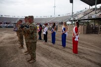 A Soldiers hold a flag during a flag retirement ceremony