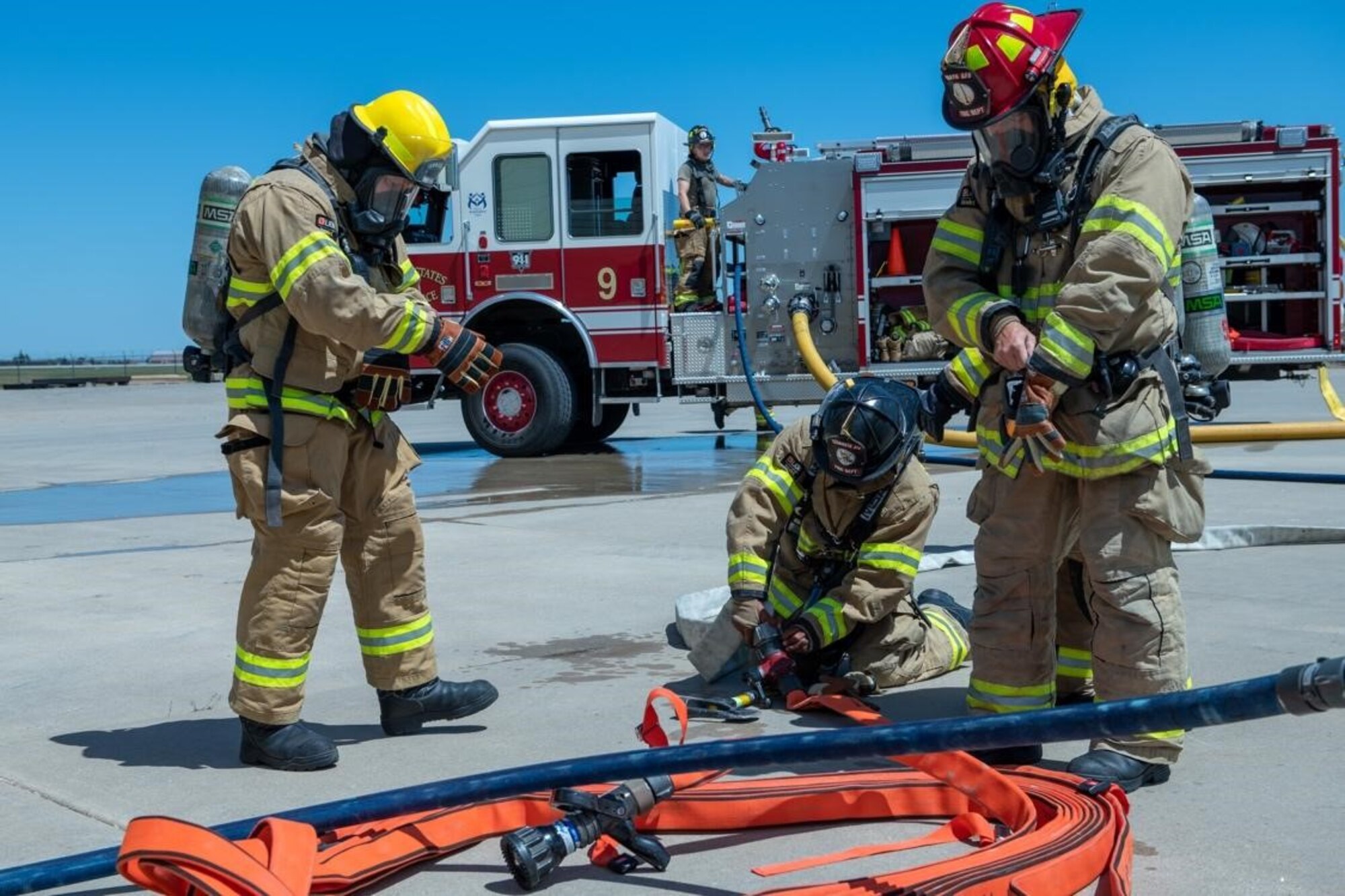 Personnel from the 28th Civil Engineering Squadron Fire Fighting Unit prepare fire protection equipment on Ellsworth Air Force Base, S.D., July 13, 2022.