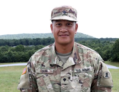 Spc. Ronald Oun, an electrical engineer assigned to the 160th Engineer Company, 721st Troop Command, 72nd Troop Command, Delaware Army National Guard poses for a photo during training at the combined arms collective training facility at Fort Indiantown Gap, Pa. July 14, 2022. (U.S. Army National Guard photo by Pfc. Aliyah Vivier)