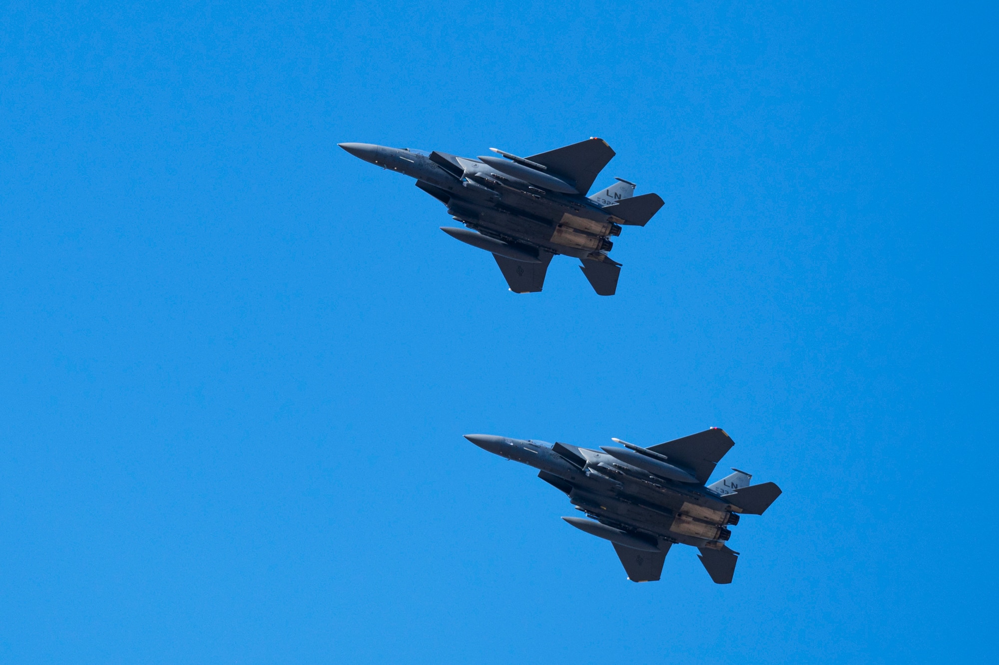 U.S. Air Force F-15E Strike Eagles assigned to the 494th Fighter Squadron, from Royal Air Force Lakenheath, England, prepare to land at Souda Air Base, Greece, July 15, 2022. The two aircraft conducted flight operations from Souda AB to an undisclosed location within the U.S. Central Command area of responsibility, in an effort to exercise cross-combatant command Agile Combat Employment operations. (U.S. Air Force photo by Tech. Sgt. Rachel Maxwell)