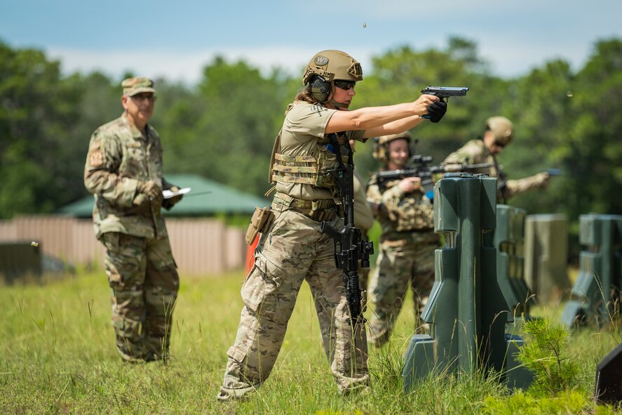 Airmen fire from behind barricades