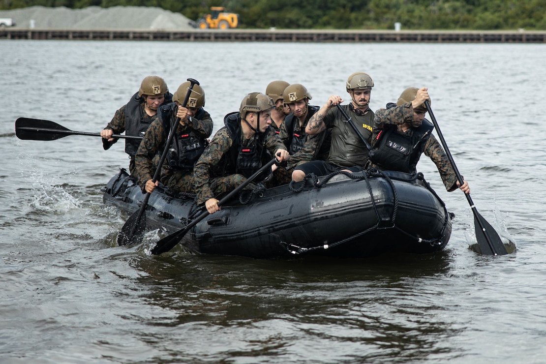 U.S. Marines with 2nd Air-Naval Gunfire Liaison Company, II Marine Expeditionary Force Information Group, paddle aboard a Combat Rubber Raiding Craft during Exercise Burmese Chase at Camp Lejeune, North Carolina, July 18, 2022. Exercise Burmese Chase is a longstanding fire support exercise hosted by 2nd ANGLICO focused on improving combat readiness and strengthening relationships with allies and partners.