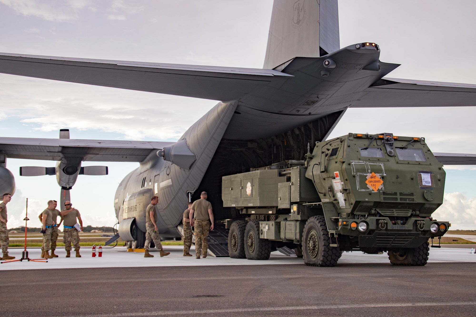 A U.S. Marine Corps High-Mobility Artillery Rocket System with 5th Battalion, 11th Marine Regiment, 1st Marine Division, loads onto a U.S. Air Force C130 Hercules assigned to Air National Guard, 133rd Airlift Wing, St. Paul, Minnesota, in support of exercise Valiant Shield 2022 at Andersen Air Force Base, Guam, June 7, 2022.