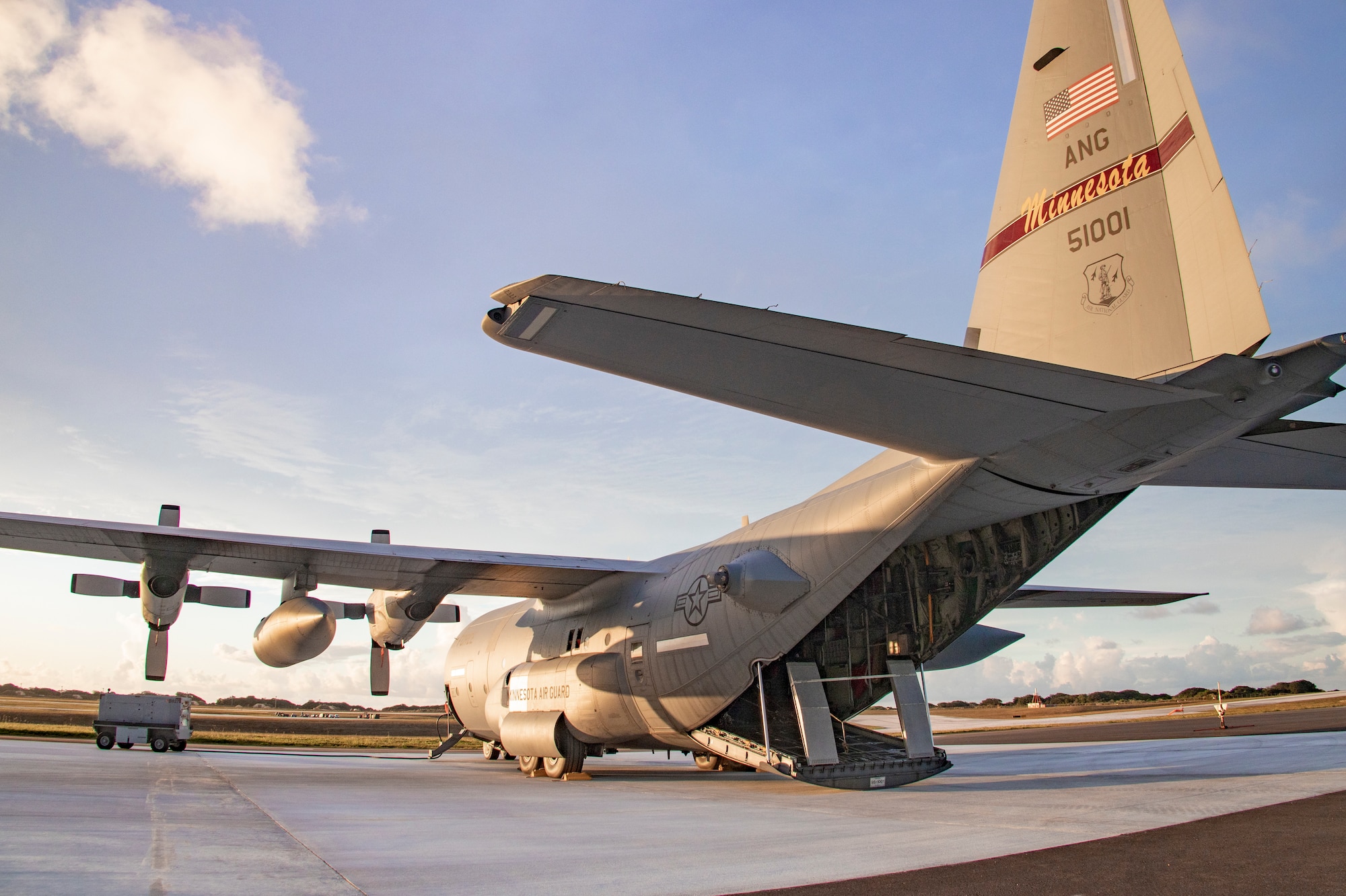 A U.S. Air Force Air National Guard C130 Hercules assigned to 133rd Airlift Wing, St. Paul, Minnesota, is staged with a U.S. Marine Corps High-Mobility Artillery Rocket System with 5th Battalion, 11th Marine Regiment, 1st Marine Division, aboard in support of exercise Valiant Shield 2022 at Andersen Air Force Base, Guam, June 7, 2022
