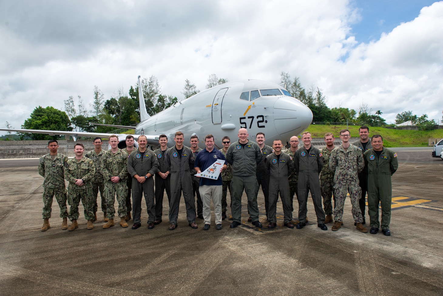 KOROR, PALAU (July 10, 2022) The Honorable John Hennessey-Niland, U.S. Ambassador to Palau, speaks to Sailors assigned to Patrol Squadron (VP) 8 during a static display of the P-8A Poseidon aircraft at Palau’s international airport, Jul. 10. VP-8 is currently deployed to NAF Misawa, Japan conducting maritime patrol and reconnaissance and theater outreach operations within U.S. 7th Fleet (C7F) area of operations in support of Commander, Task Force 72, C7F, and U.S. Indo-Pacific Command objectives throughout the region. (U.S. Navy photo by Mass Communication Specialist 1st Class Juan Sebastian Sua/Released)