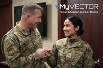 Col. Daniel Voorhies, 341st Missile Wing vice commander; congratulates Senior Airman Monica Figueroa Santos, 341st MW command post senior nuclear command and control emergency actions controller, for being named as one of Air Force Global Strike Command’s twelve Outstanding Airmen of the Year April 13, 2022, at Malmstrom Air Force Base, Mont. After winning Airman of the Year at the wing and Numbered Air Force levels, Figueroa Santos will go on to compete at the Air Force level. (U.S. Air Force photo by Staff Sgt. Tristan Truesdell)
