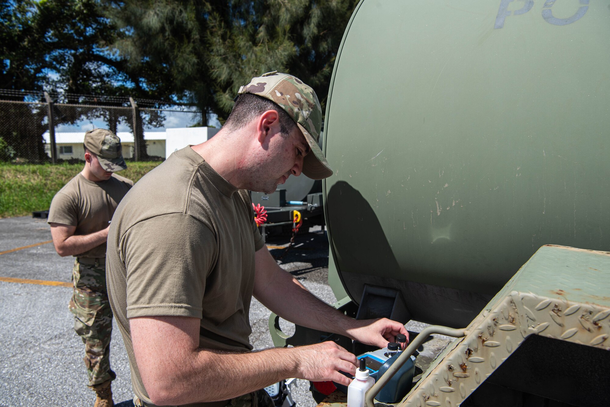 An Airman uses a colorimeter.