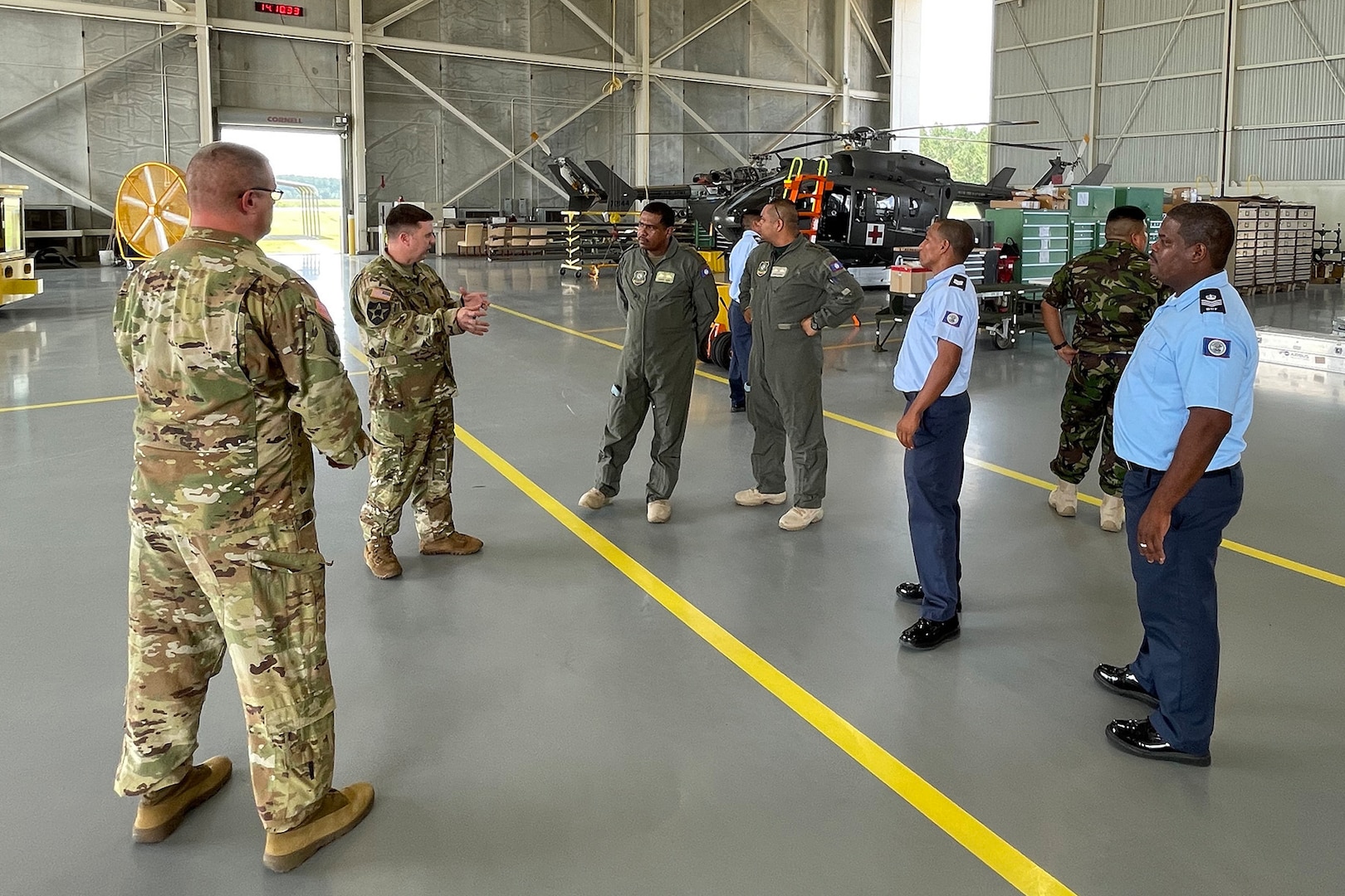 Louisiana National Guard members of the 204th Theater Airfield Operations Group brief members of the Belize Defence Force on their aircraft maintenance program in Hammond, Louisiana, July 12, 2022. The LANG and BDF are partners in the Department of Defense National Guard Bureau State Partnership Program.