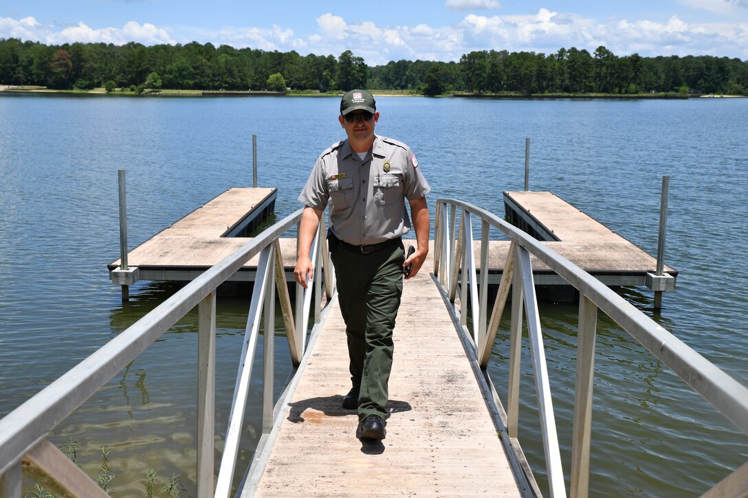 Josh Davis, Chief Ranger at the Walter F. George Resource Office, inspects a floating dock on the Walter F. George Reservoir, Georgia July 6, 2022. Inspecting and ensuring docks are safe and secure is just one of the many tasks a ranger performs at U.S. Army Corps of Engineers parks.