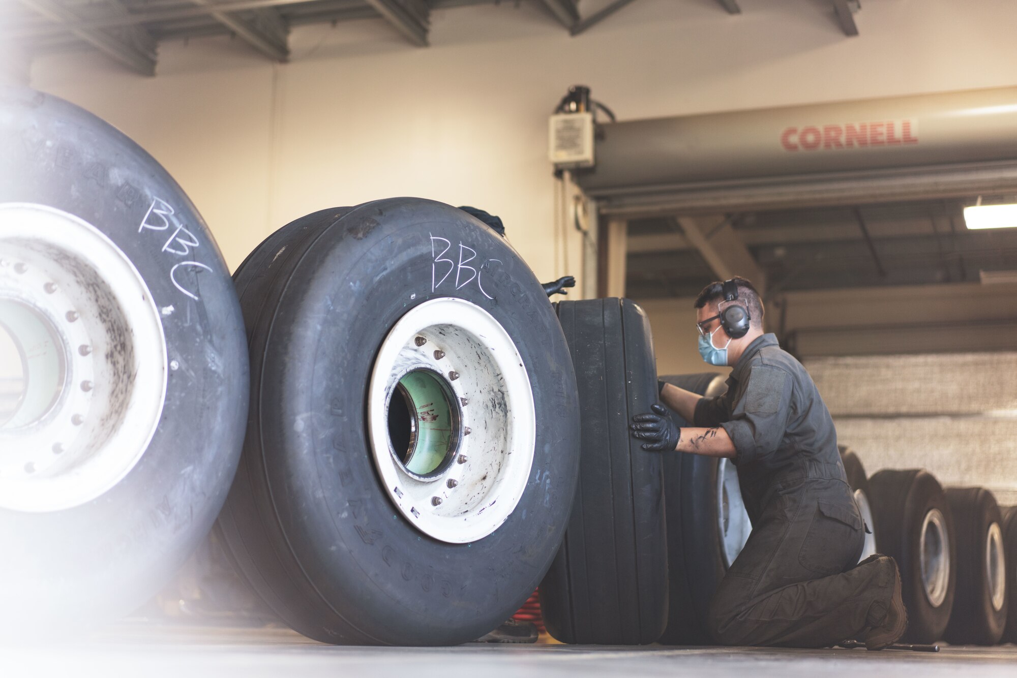 Airman fixing tires