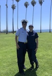 Mentoring Program participants Ensign Ryan Huffman and YN3 Brooke Gould at the ceremony earlier this year where Huffman was recognized as the Reservist Person of the Year. Photo taken at Sector Los Angeles/Long Beach.