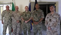Coalition members, including British Army Brig. Karl Harris, the deputy commanding general of Combined Joint Task Force - Operation Inherent Resolve (CJTF-OIR), second from right, pose for a photo before a defense attaché forum July 19, 2022, in Baghdad, Iraq. The defense attaché forum brought together defense attachés from several Global Coalition countries as well as representatives from CJTF-OIR and interagency partners to discuss topics including the need for increased repatriation and reintegration of displaced persons from northeast Syria to reduce ISIS influence in those vulnerable populations; the threat of ISIS members in detention centers operated by Syrian Democratic Forces in northeast Syria; and the need for greater international action to address these ongoing security and humanitarian challenges.  (U.S. Army photo by Sgt. Brian Reed)
