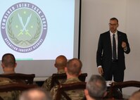 Mr. Giorgi Gigauri, the Chief of Mission for International Organization for Migration (IOM) spoke at the defense attaché forum about the strategic and operational framework for durable solutions of individual displaced persons on July 19,2022 in Baghdad, Iraq. The defense attaché forum allowed the Global Coalition member and invited guest to discuss topics pertaining to repatriation and reintegration of displaced persons. (U.S. Army photo by Sgt. Brian Reed)