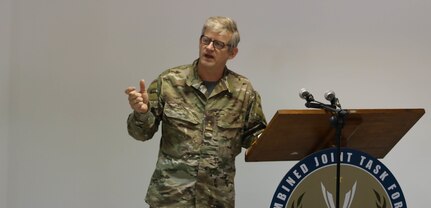 Dutch Lt. Col. Jan Willem de Wolf speaks at the defense attaché forum July 19, 2022 in Baghdad, Iraq. The forum participants broke into smaller groups for more in-depth discussions and then selected a representative to brief the complete forum about their respective discussion groups. The defense attaché forum brought together defense attachés from several Global Coalition countries as well as representatives from CJTF-OIR and interagency partners to discuss topics including the need for increased repatriation and reintegration of displaced persons in northeast Syria to reduce ISIS influence in those vulnerable populations; the threat of ISIS members in detention centers operated by Syrian Democratic Forces in northeast Syria; and the need for greater international action to address these ongoing security and humanitarian challenges. (U.S. Army photo by Sgt. Brian Reed)