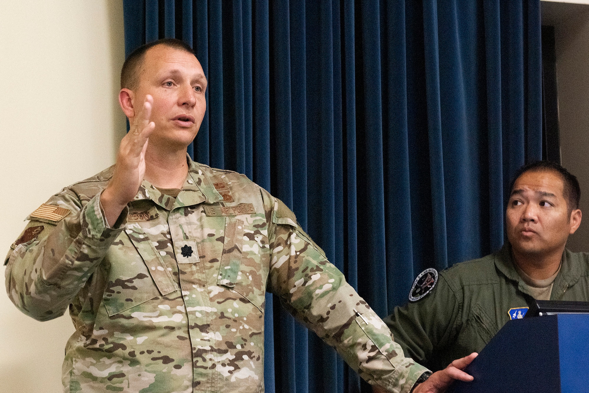 U.S. Air Force Lt. Col. Benton Jackson, 193rd Special Operations Wing Unit Conversion Officer, goes over a few points in a briefing for the Site Activation Task Force