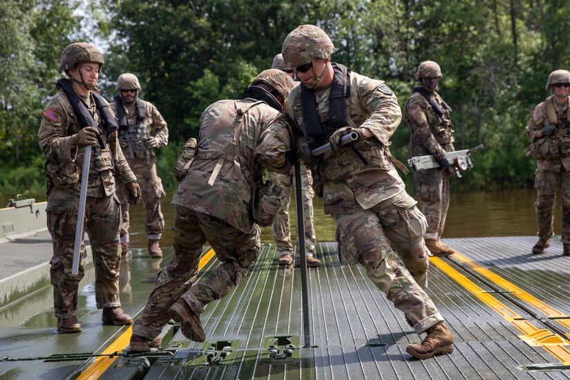 Engineers conduct floating bridge operations at Camp Ripley